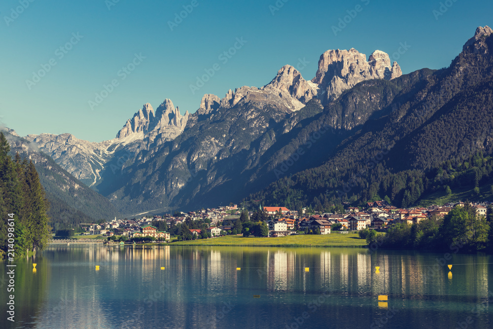 Beautiful mountain village landscape of Villapiccola and Lake Auronzo in Italy.