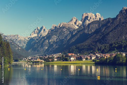 Beautiful mountain village landscape of Villapiccola and Lake Auronzo in Italy.