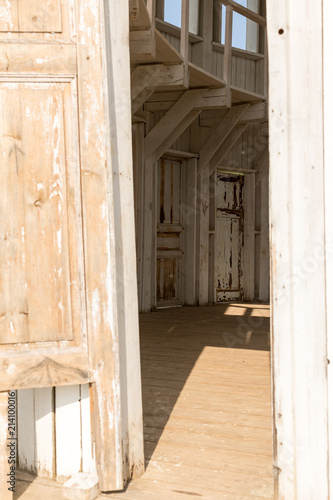 Russia, Nikola-Lenivets. White wooden rotunda with many doors in the Art Park Nikola Lenivets. Festival of landscape objects Archstoyanie. National park, Kaluga Region, Russia. photo