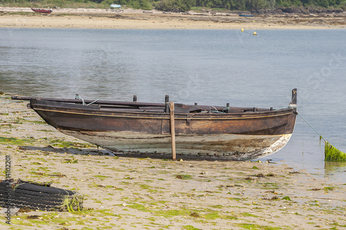 wooden fishing boat on the coast