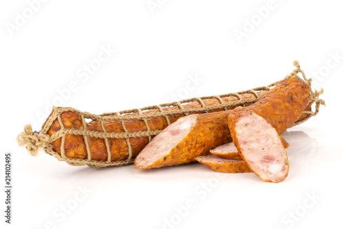 Vászonkép Group of one whole one half three slices of dry smoked ham sausage isolated on w