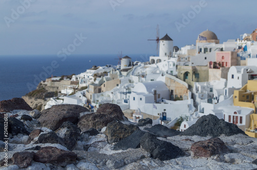 Whitewashed Houses and Windmill on Cliffs with Sea View in Oia, Santorini, Cyclades, Greece
