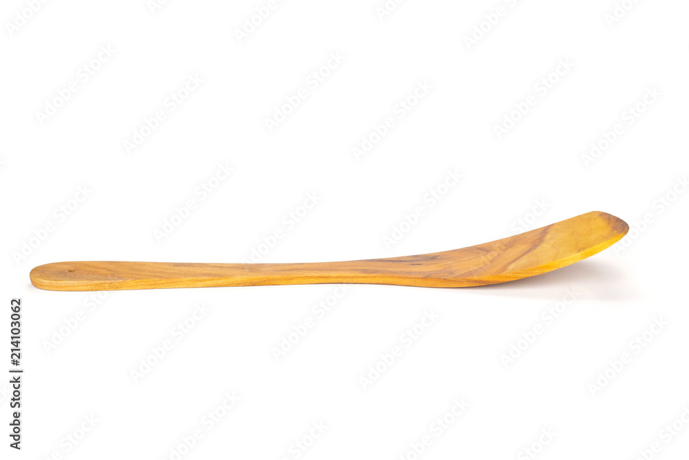 One whole kitchen tool olive wood flat spatula with long handle isolated on white One whole kitchen tool olive wood flat spatula with long handle isolated on white