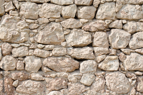 orange wall of a wild stone close up