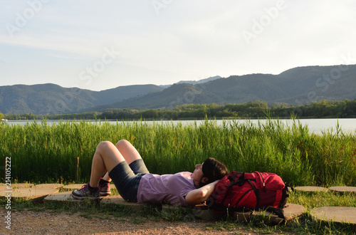 Hiker woman resting after walking