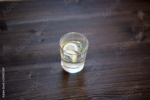 photo of a drink in a transparent glass on a dark background