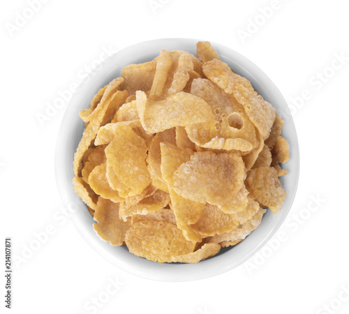 Breakfast cereal cornflakes in white ceramic bowl isolated on white background