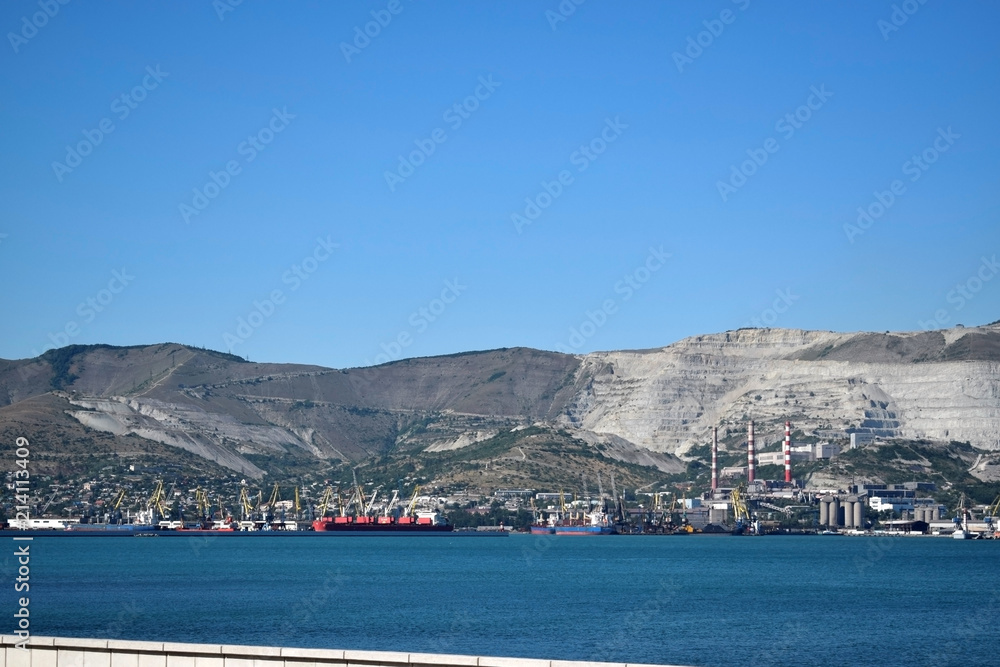 Novorossiysk, Russia - July 3, 2018: The view on the sea port and the mountains from the embankment