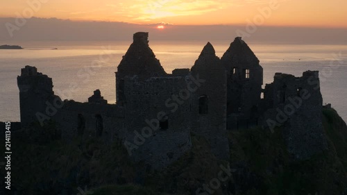 Ireland, sunset over Dunluce castle ruin, close shot