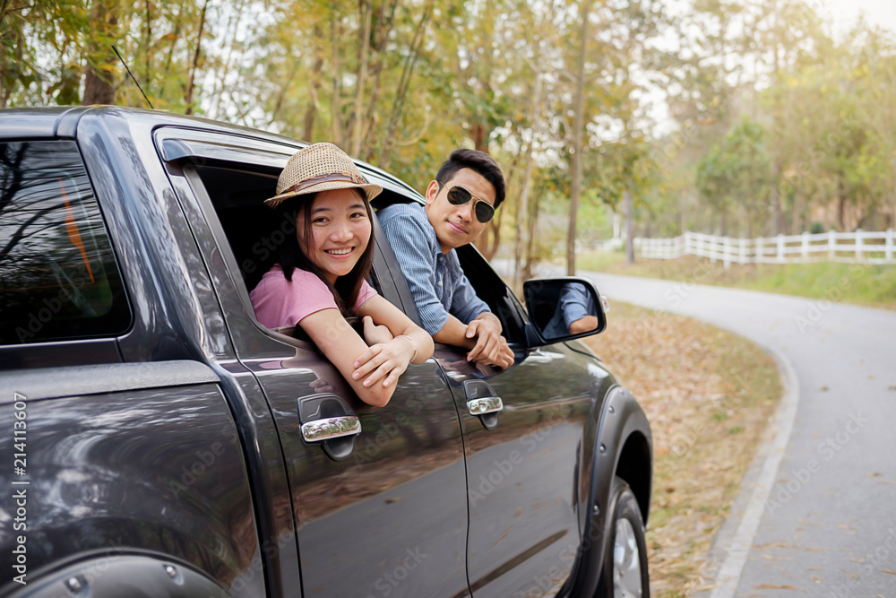 Young couple driving in car traveler. Travel concept Young couple driving in car traveler. Travel concept