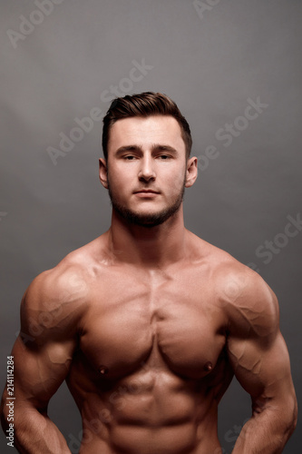 Athletic Man Fitness Model Torso showing big muscles.