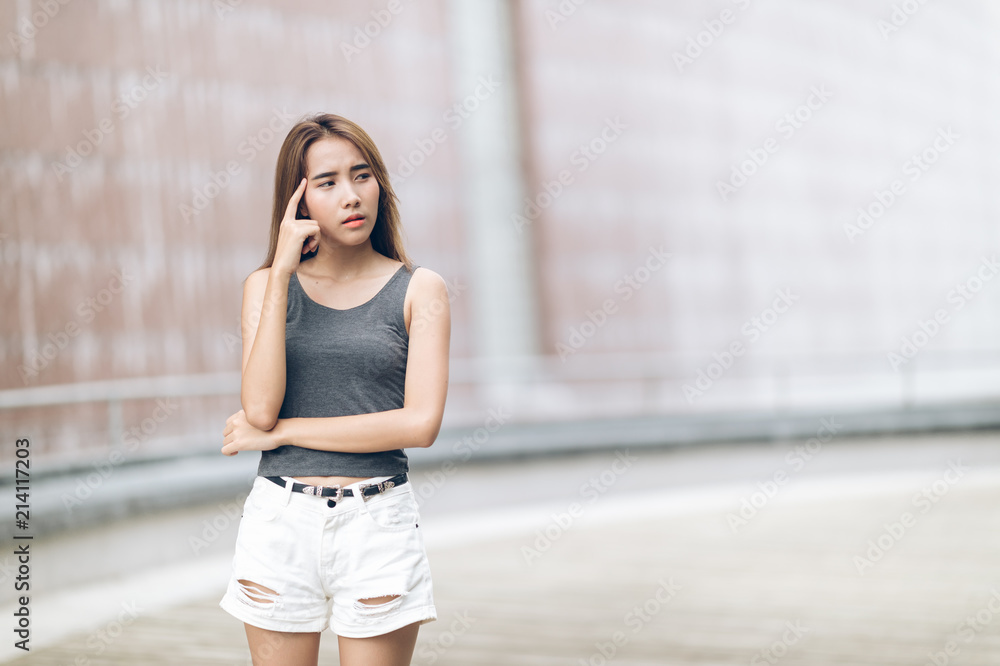 attractive asian woman thinking attractive asian woman thinking