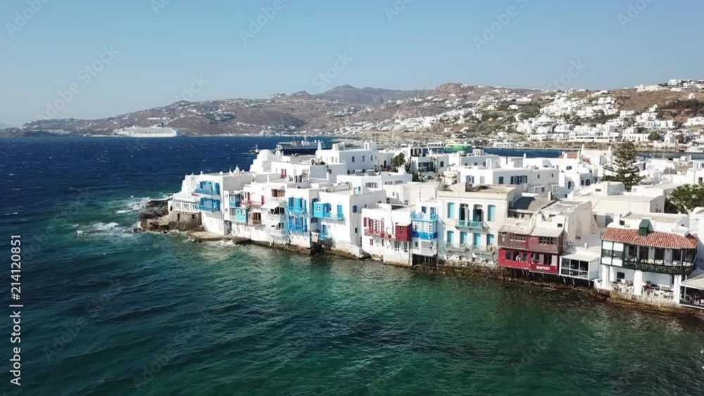 Aerial drone bird's eye view video of iconic little Venice and church of Paraportiani in chora of Mykonos island, Cyclades, Greece Aerial drone bird's eye view video of iconic little Venice and church of Paraportiani in chora of Mykonos island, Cyclades, Greece
