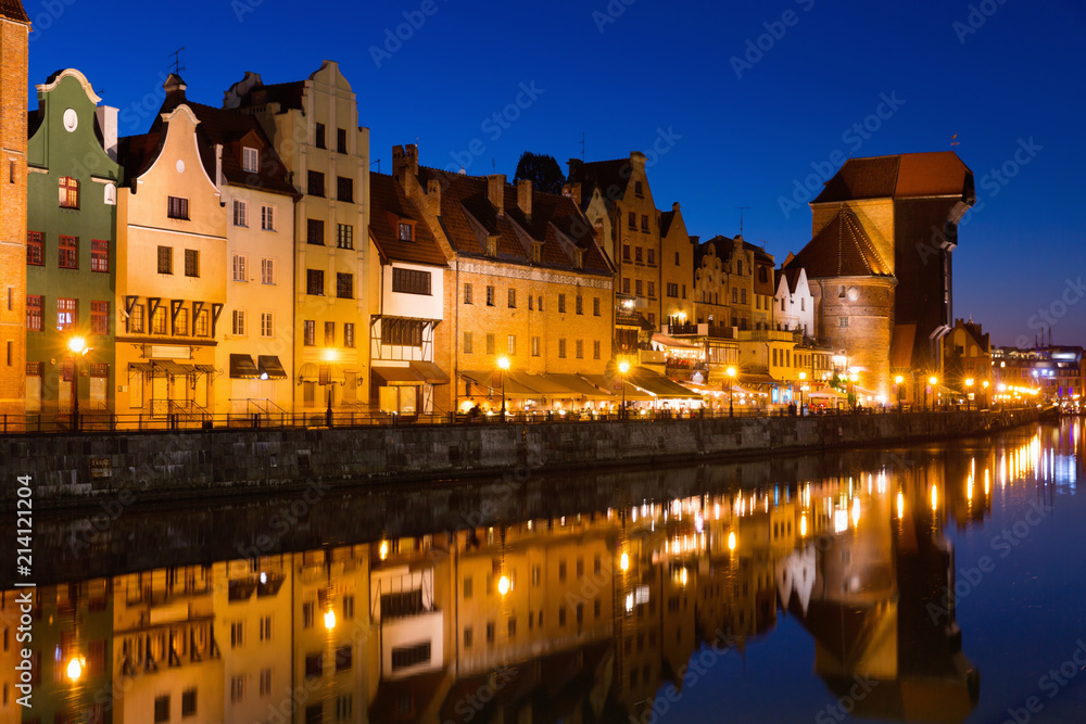 View on illumination of night embankment of Moltawa River in Gdansk