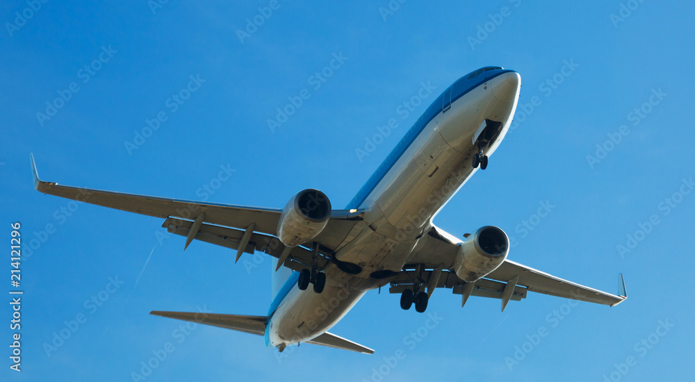 Passenger plane departing in afternoon