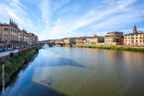 Colorful old buildings line the Arno River in Florence, Italy © k_samurkas