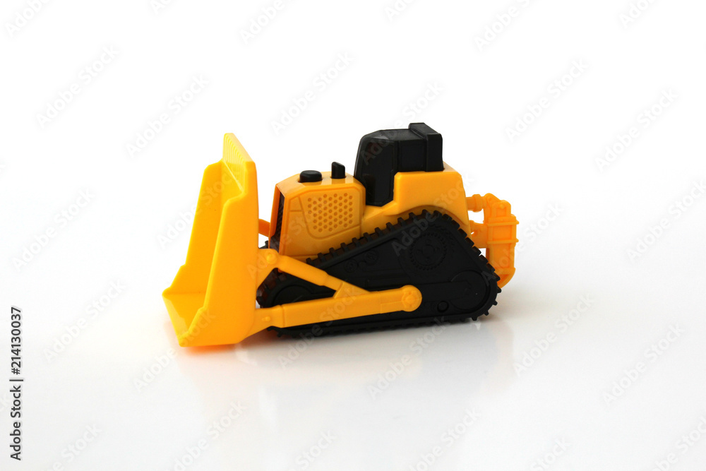 Fototapeta premium A Toy bulldozer on an isolated white background 2