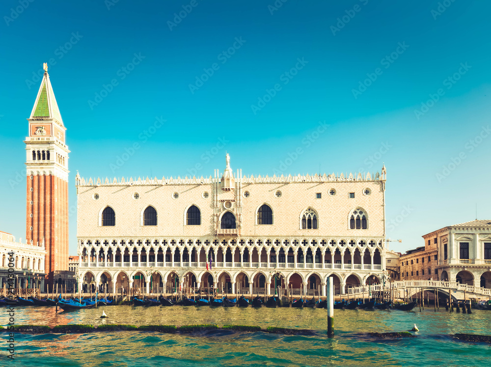 Fototapeta premium San Marco belltower and Doge palace at summer day, Venice, Italy, toned