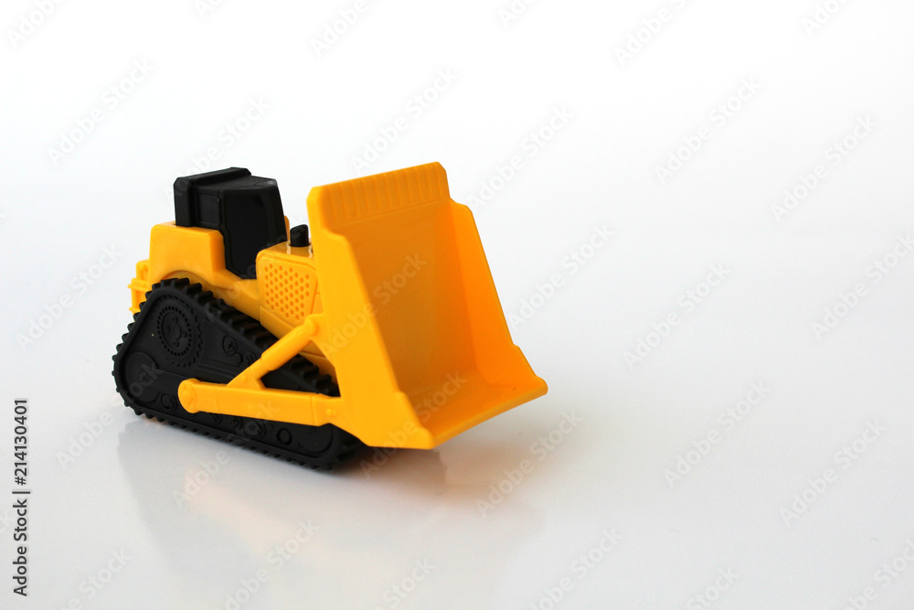 Fototapeta premium A Toy bulldozer on an isolated white background 6
