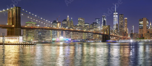 Brooklyn Bridge and Manhattan skyline at night, NYC.