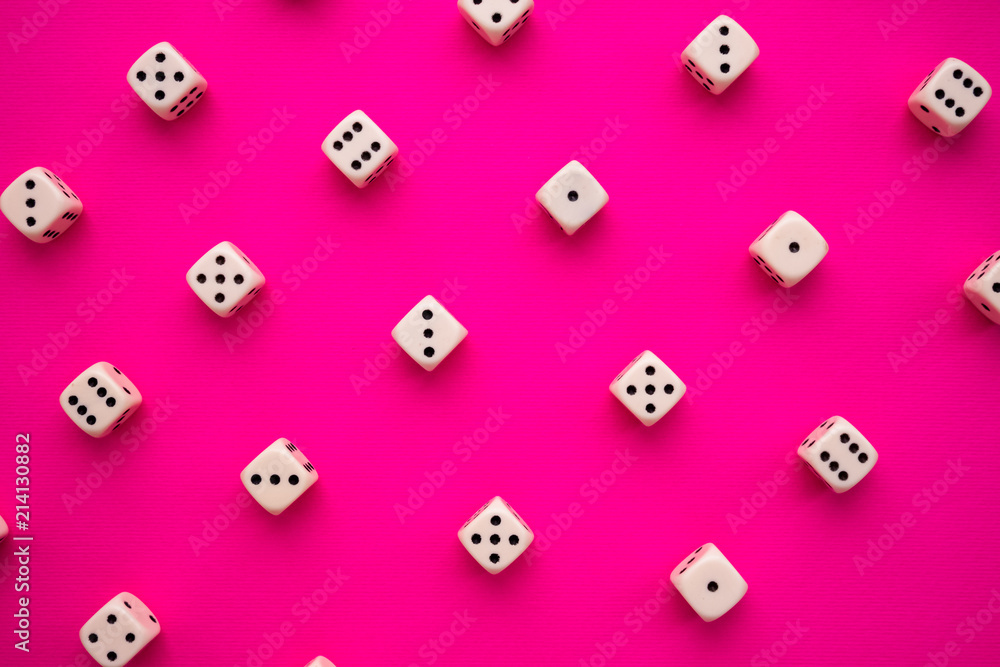 dice on a magenta background dice on a magenta background