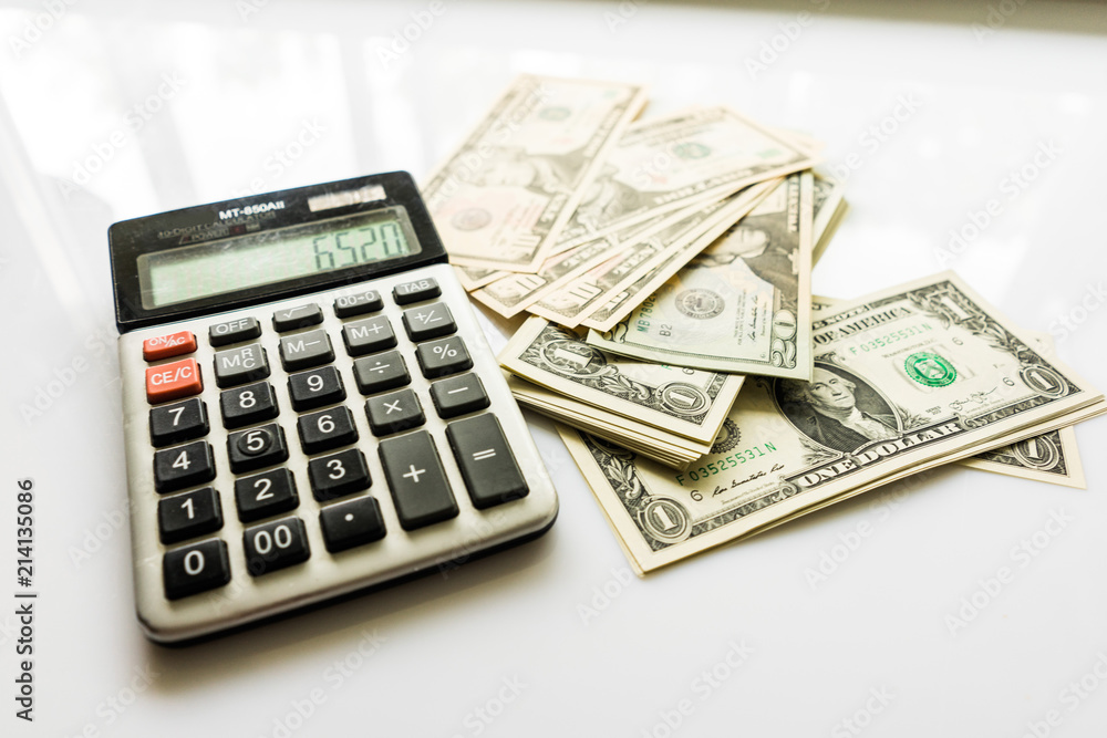 Close-up Money and Calculator, American Dollar Banknotes Close-up Money and Calculator, American Dollar Banknotes