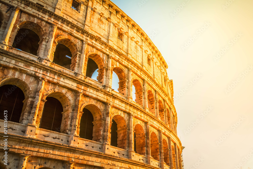 ruins of Colosseum at sunrise light in Rome, Italy, toned