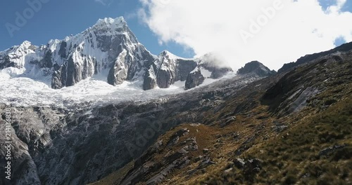 An aerial view of a 6000m mountain in the peruvian andes. photo