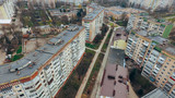 drone flies over the roofs of multi-storey houses, squares and streets. aerial view Ternopil. Ukraine