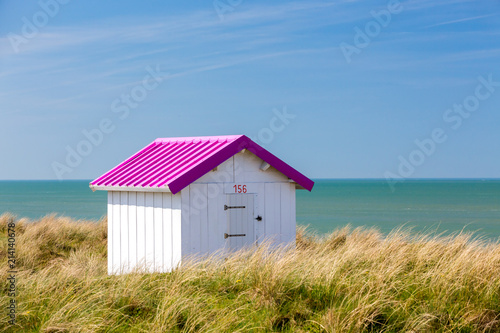 Colorful wooden beach cabins in the dunes  Gouville-sur-Mer  Normandy  France