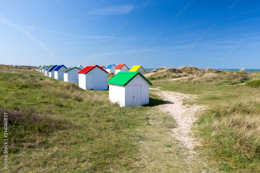 Φωτογραφία Colorful wooden beach cabins in the dunes, Gouville-sur-Mer, Normandy, France