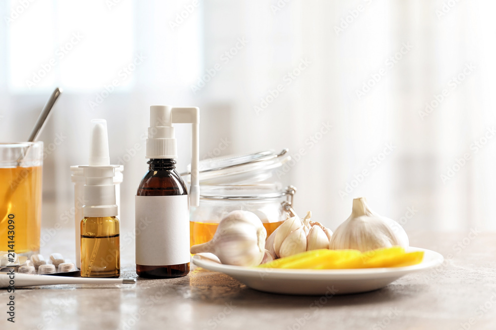 Natural and medical cold remedies on table Natural and medical cold remedies on table