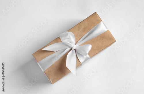Beautifully wrapped gift box on white background, top view © New Africa