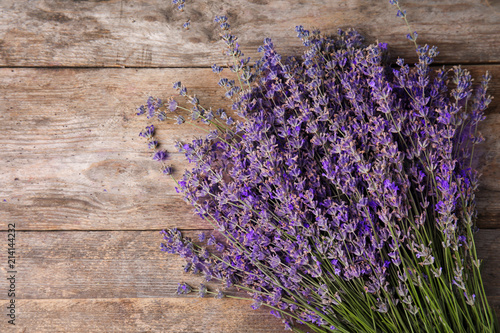 Lavender flowers on wooden background  top view