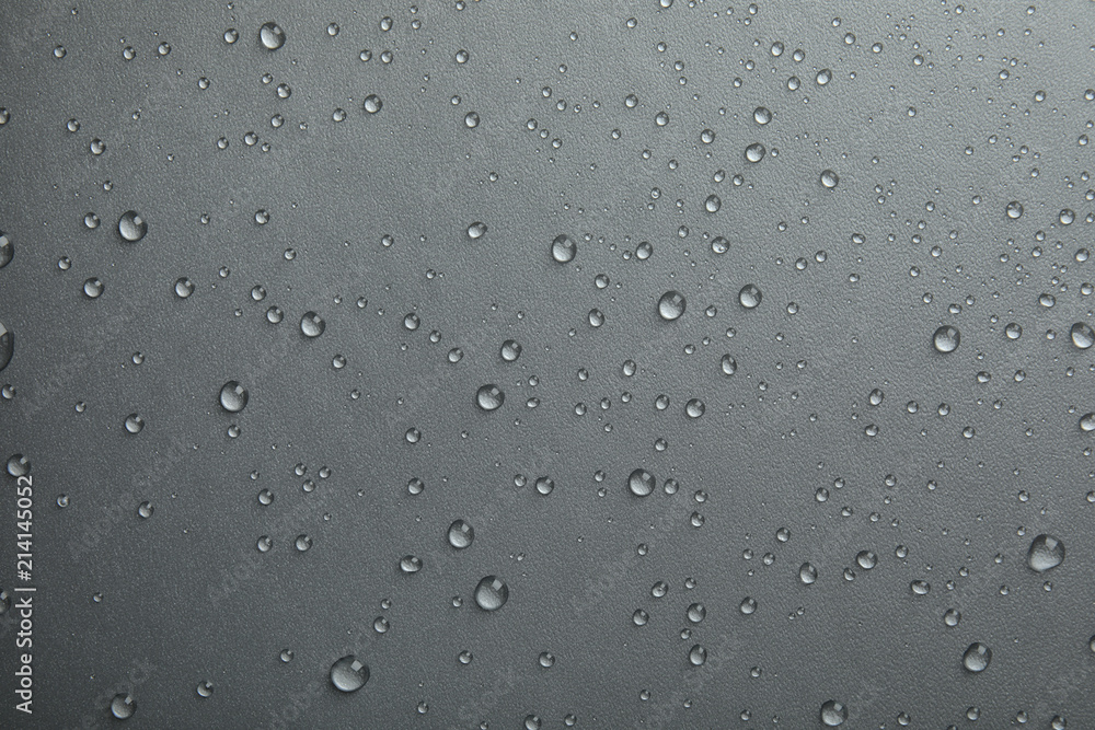 Many clean water drops on grey background Many clean water drops on grey background