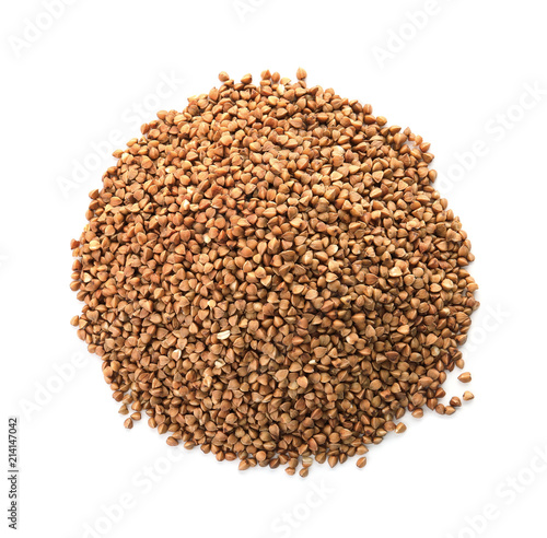 Raw buckwheat on white background. Healthy grains and cereals