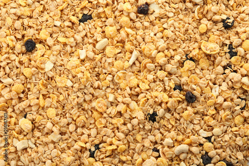 Muesli with raisins as background. Healthy grains and cereals