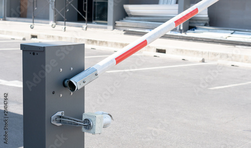 Quadro em tela Automatic car barrier gate security in the city park