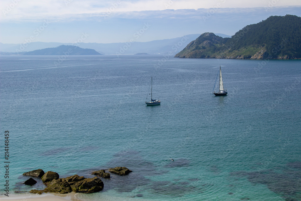 Sailboats anchoring on the coast of the Cíes Islands