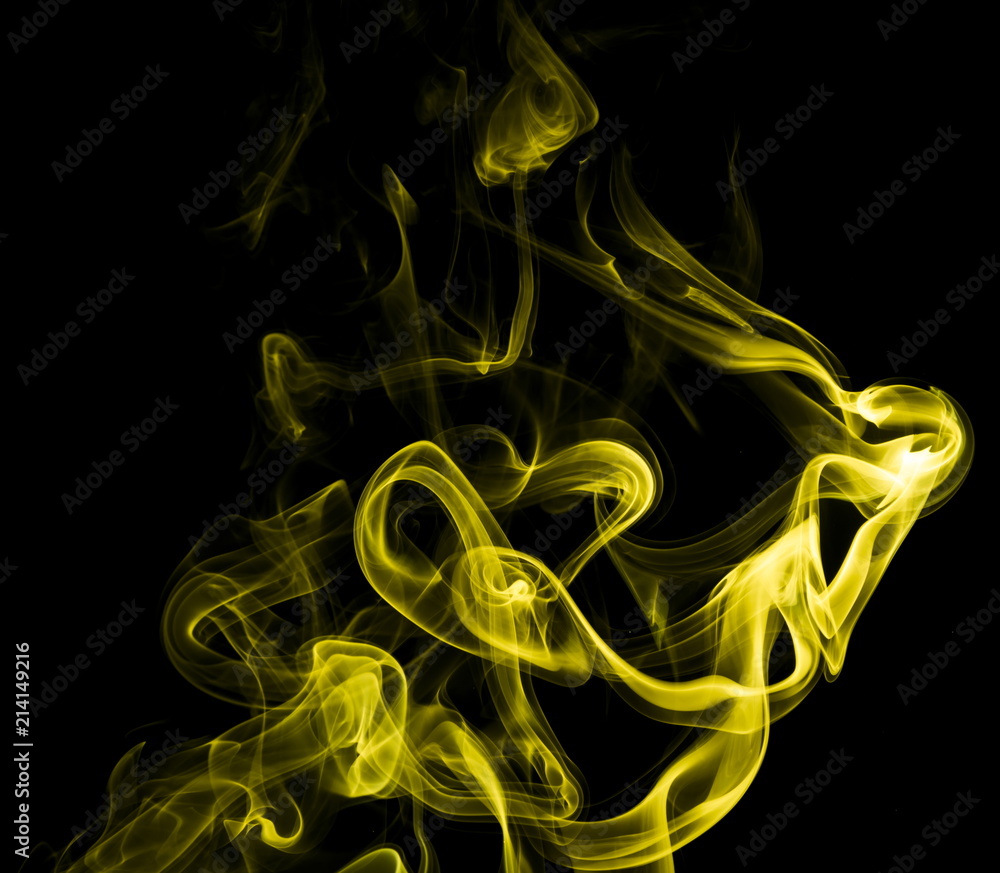 Yellow smoke on black background Yellow smoke on black background