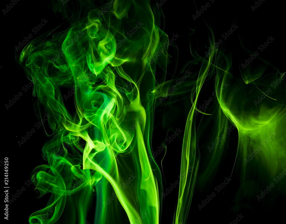 Green smoke on black background Green smoke on black background