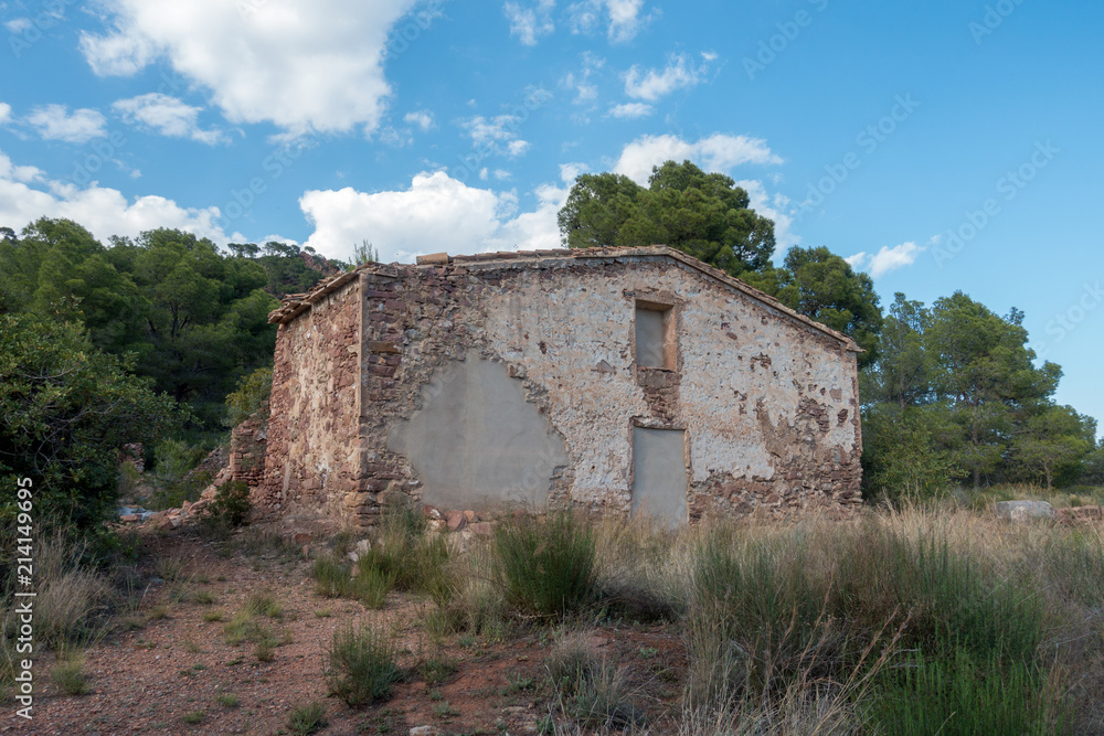 An abandoned house in the middle of the forest An abandoned house in the middle of the forest