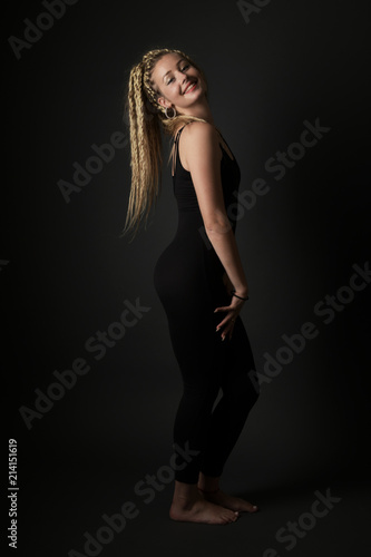 Blonde young woman dancing dancehall