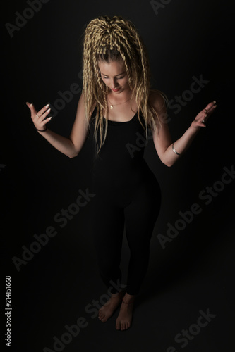 Blonde young woman dancing dancehall