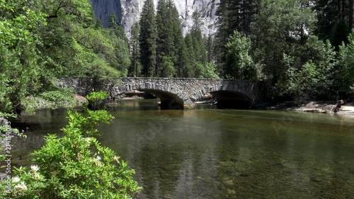 summer time panning clip of pohono bridge at yosemite national park in the united states of america photo