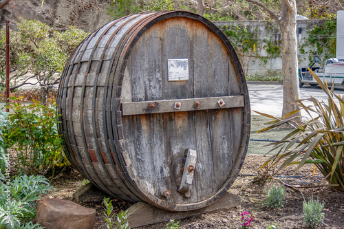 Upended Large Weathered Wooden Wine Barrel