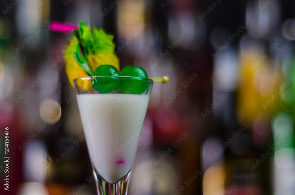 exotic drink based on Malibu rum and other ingredients, cocktail prepared by the bartender exotic drink based on Malibu rum and other ingredients, cocktail prepared by the bartender