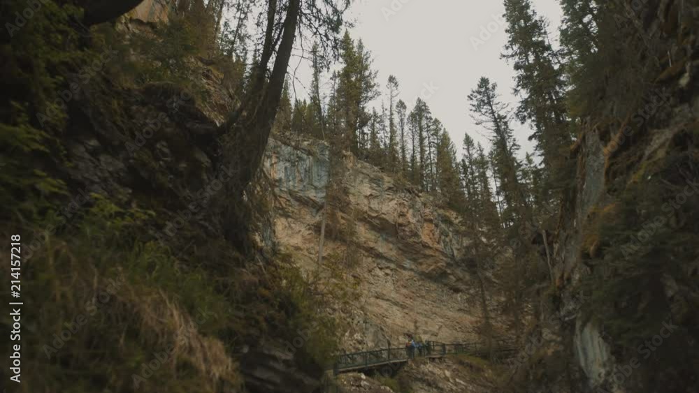 4K Turquoise Stream in Johnston Canyon, Banff, Alberta, Canada - wide angle, daytime, closeup 4K Turquoise Stream in Johnston Canyon, Banff, Alberta, Canada - wide angle, daytime, closeup