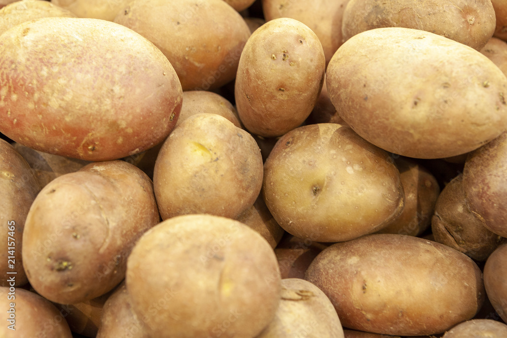 Pile of fresh organic potatoes top view close up. Pile of fresh organic potatoes top view close up.