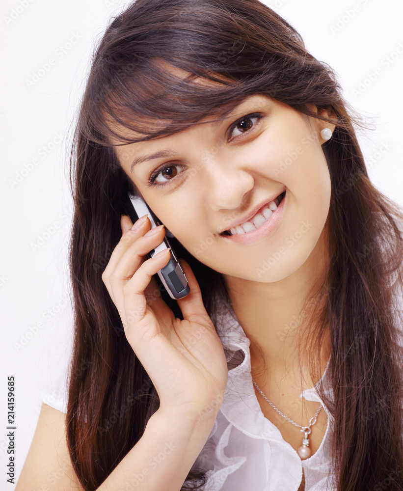 smiling young woman talking on a mobile phone smiling young woman talking on a mobile phone